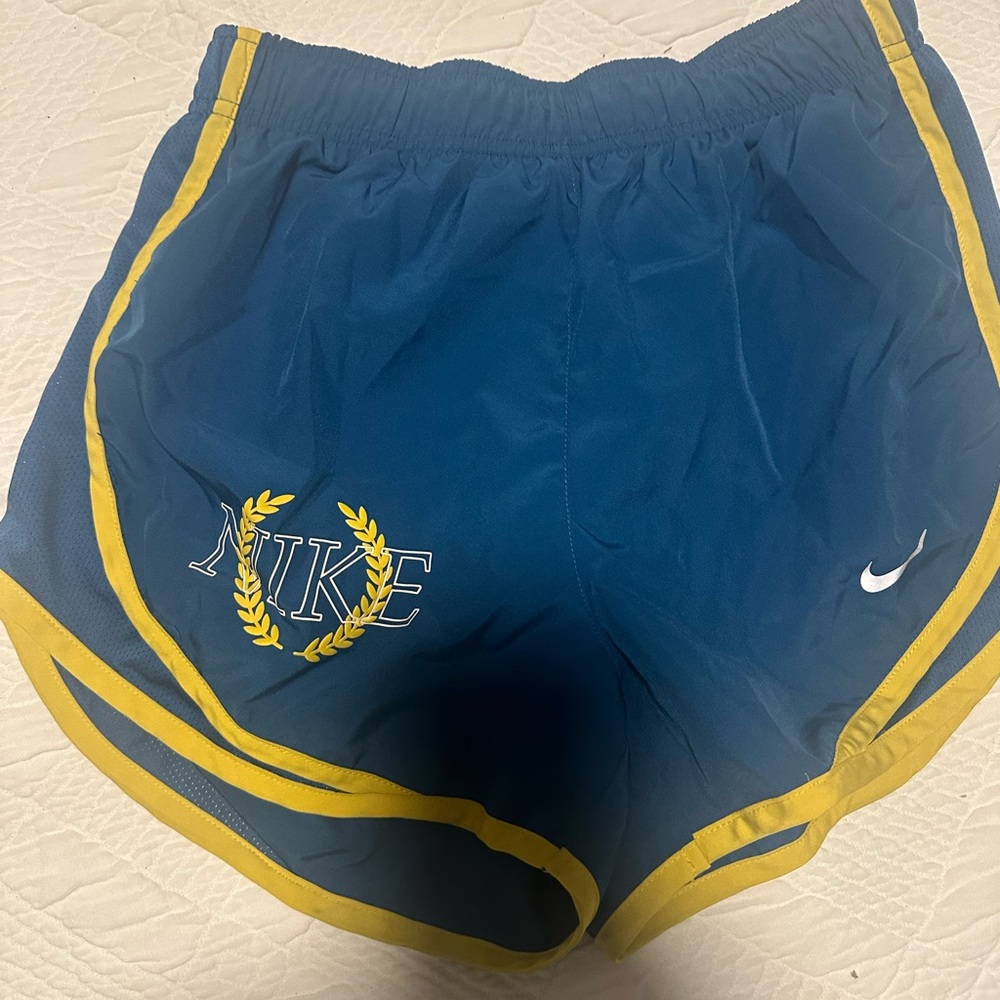 Nike Women's Navy Shorts with Yellow Trim